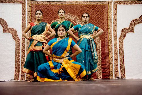 Sreedevi Dadithota (center), Lalitha Dandipalli, Bhavitha Bhattipati and Charitha Ragyari dance during the 17th annual Festival of India at the Gwinnett Center in Duluth on Saturday, August 24, 2013. 
