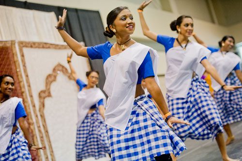 Shruti Prathip (center) dances during the 17th annual Festival of India at the Gwinnett Center in Duluth on Saturday, August 24, 2013. 