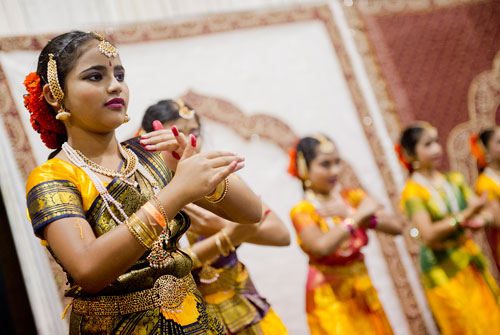 Srija Vanam (left) dances during the 17th annual Festival of India at the Gwinnett Center in Duluth on Saturday, August 24, 2013. 