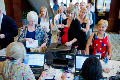 Cindy Gillespie (left), Linda Lee and Karen Gillespie register for the 2013 National Conference of State Legislators at the Omni Hotel in Atlanta on Sunday, August 11, 2013. 5,000 attendees are expected at the conderence this year including around 1,000 state legislators from all over the nation.