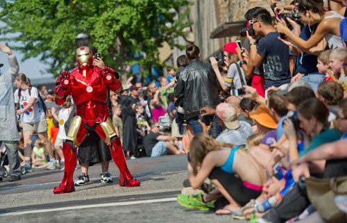 Dressed as Iron Man, Kevin Mathis marches in the annual DragonCon parade through downtown Atlanta on Saturday, August 31, 2013. 