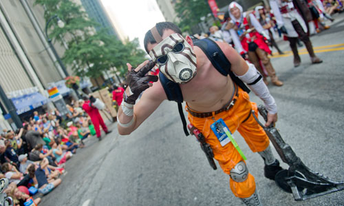 Dressed as Phsyco, a character from the video game Borderlands 2, James Davis  marches in the annual DragonCon parade through downtown Atlanta on Saturday, August 31, 2013.