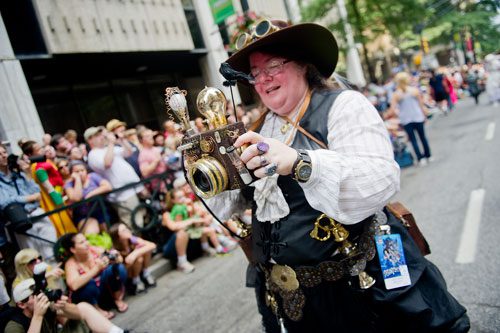 Dressed in steampunk attire, Janet Sella marches in the annual DragonCon parade through downtown Atlanta on Saturday, August 31, 2013. 