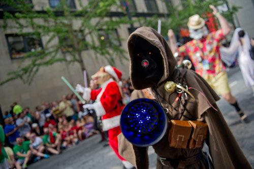 Dressed as a character from Star Wars, Stephen Eisenhauer marches in the annual DragonCon parade through downtown Atlanta on Saturday, August 31, 2013. 