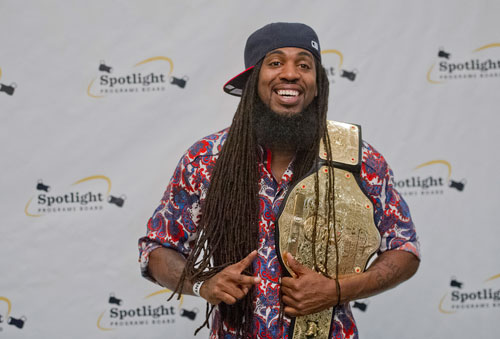 Pastor Troy poses for photos at Georgia State University in Atlanta during the LudaDay Weekend Block Party on Saturday, August 31, 2013. 