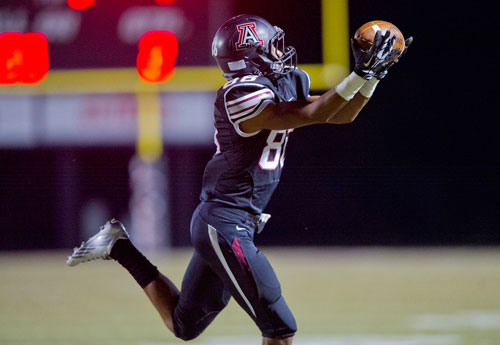 Alpharetta's Daniel Clements (86) reaches out to snag the pass during their game against Lovejoy on Friday, September 13, 2013. 
