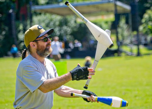 Alan Tidwell juggles during the Reynoldstown Wheelbarrow Festival at Lang Carson Park in Atlanta on Saturday, September 14, 2013. 