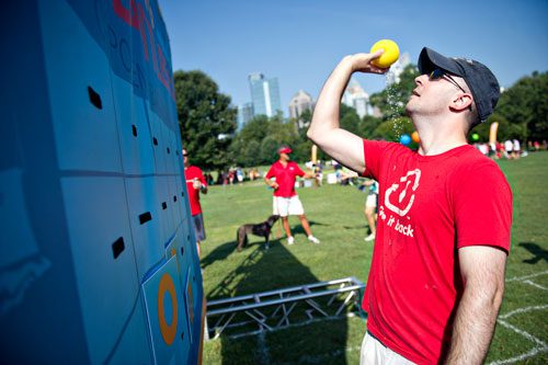 Brian Genco plays a game of living battleship during the Boys & Girls Clubs of America's Day for Kids at Piedmont Park in Atlanta on Saturday, September 7, 2013. 