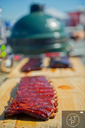 Spare ribs sit on a cutting board during the Atlanta Bar-B-Q Festival at Atlantic Station in Midtown on Saturday, September 14, 2013.
