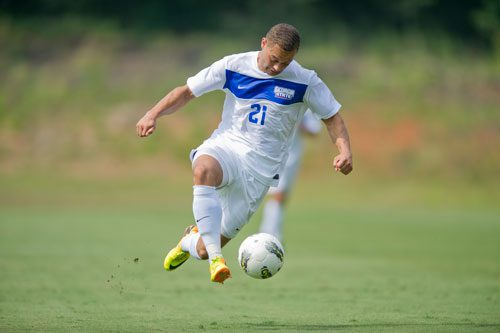 Georgia State's William Mellors-Blair passes the ball while in mid-air during their game against Liberty University on Friday, August 30, 2013.
