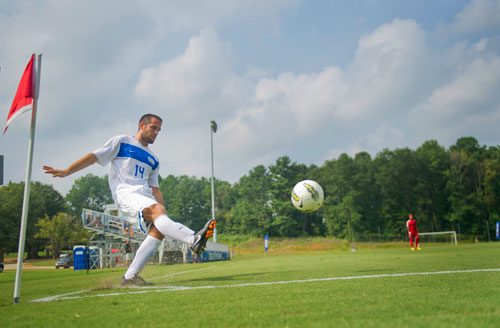 Georgia State's Bo Stroup (14) launches the ball into the air for a corner kick during their game against Liberty University on Friday, August 30, 2013.