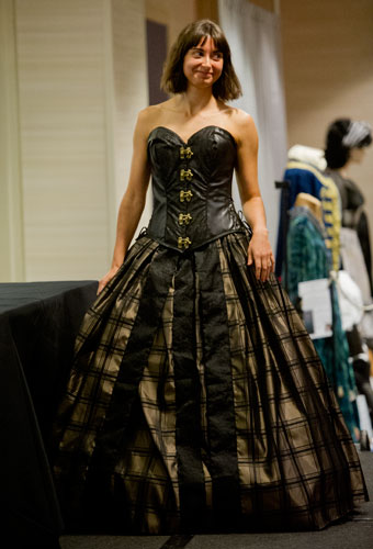A model showcases one of the latest costume creations during the Dealer Costuming Fashion Show at DragonCon in downtown Atlanta on Saturday, August 31, 2013.