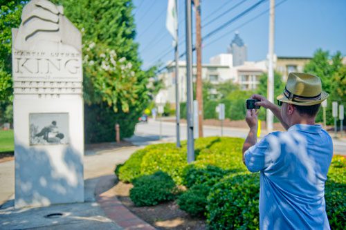 Ken Chitester takes a photo of the Martin Luther King Jr. National Historic Site marker in the Old Fourth Ward neighborhood of Atlanta on Wednesday, September 4, 2013.