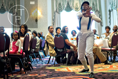 Alecea Housworth dances during the first annual Fowler Family Celebration of Love at Villa Christina in Atlanta on Sunday, September 15, 2013.