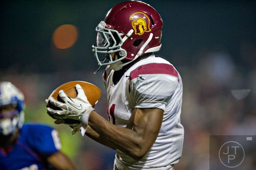 Lassiter's Quincy Perdue catches the ball for the fourth touchdown of their game against Walton on Friday, October 4, 2013. 
