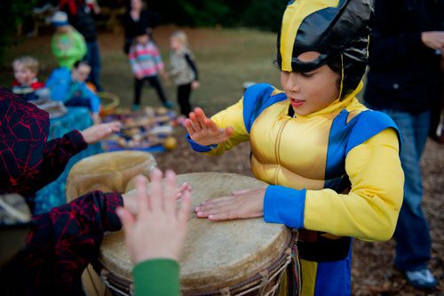 Benjamin Lopresti bangs on a drum as he waits to go on a Halloween Hike at the Chattahoochee Nature Center in Roswell on Saturday, October 19, 2013.