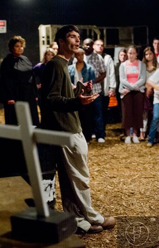 Trip Walters performs a scene during Hell's Gates at Lighthouse Baptist Church in Dawsonville on Thursday, October 17, 2013.