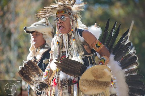 Chumsey Harjo (center) dances during the Indian Festival & Pow-Wow at Stone Mountain Park on Sunday, November 3, 2013. 