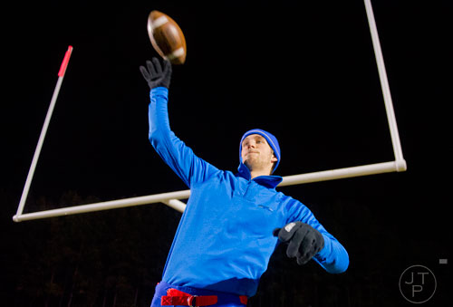 Walton's kicker Christian Lucas loosens up before their game against Collins Hill on Friday, November 15, 2013. 