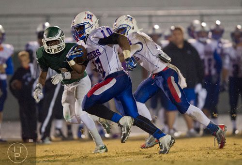 Walton's KK Brooks (10) runs the ball down the field during their game against Collins Hill on Friday, November 15, 2013.