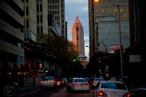 The sun sets over downtown Atlanta on Saturday, November 2, 2013.