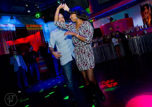 Louis Rocca (left) dances with Allyson Williams at the Havana Club in the Buckhead neighborhood of Atlanta on Saturday, November 2, 2013.