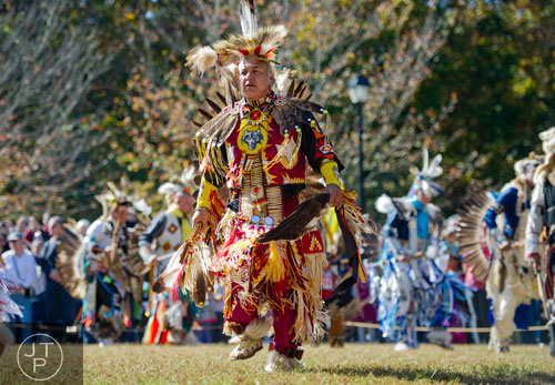 Rick Bottch dances during the Indian Festival & Pow-Wow at Stone Mountain Park on Sunday, November 3, 2013.