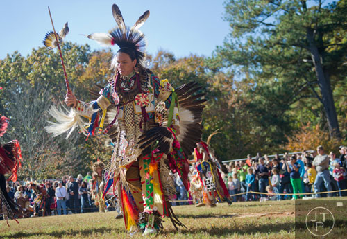 Lonnie Street dances during the Indian Festival & Pow-Wow at Stone Mountain Park on Sunday, November 3, 2013.