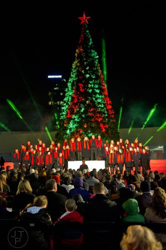 The Macy's All Star Holiday Choir performs on stage during the 66th annual Macy's Great Tree Lighting at Lenox Square Mall in Atlanta on Thursday, November 28, 2013. 