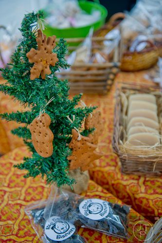 The Big Daddy Biscuits booth at the farmers market in Marietta Square has a bunch of choices when it comes to gifts for the holidays including freshly made ornament treats and stockings filled with treats.  