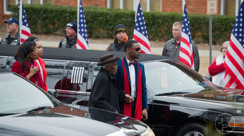 Members of United States Army Sergeant First Class Omar Forde's family arrive at NorthStar Church in Kennesaw for his funeral service on Saturday, December 28, 2013. 