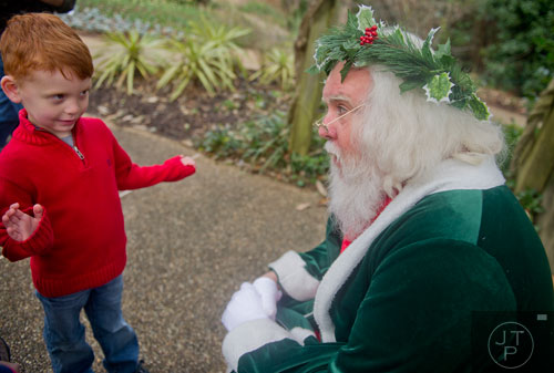 Harper Cauthen visits with Santa Claus at the Atlanta Botanical Garden on Saturday, December 7, 2013.