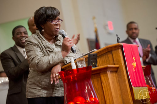 Rev. Dr. Martha Simmons gives a guest sermon during the worship services at Mt. Welcome Missionary Baptist Church in Decatur on Sunday, December 8, 2013.