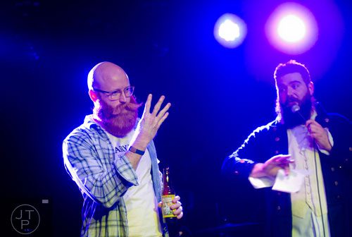Graeme Nelson (left) competes during Battle of the Beards at Smith's Olde Bar in Atlanta on Saturday, December 14, 2013. 