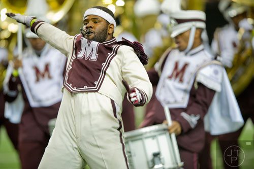 Morehouse College drum major Tre Wells (center) performs during the 2014 Honda Battle of the Bands at the Georgia Dome in Atlanta on Saturday, January 25, 2014. 