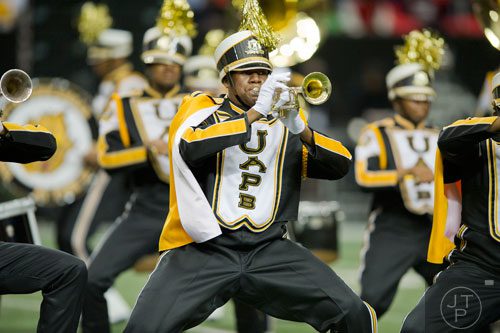 University of Arkansas at Pine Bluff's Jon Derek McCann (center) plays his trumpet during the 2014 Honda Battle of the Bands at the Georgia Dome in Atlanta on Saturday, January 25, 2014. 