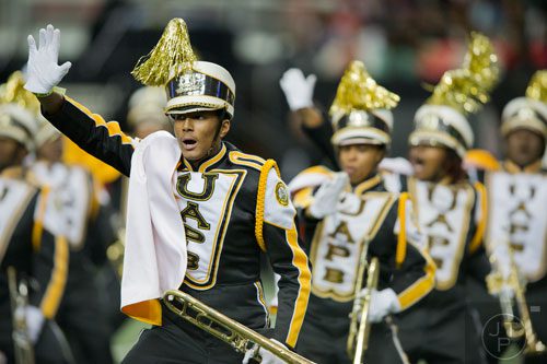 University of Arkansas at Pine Bluff's Gejuan Thompson (center) performs during the 2014 Honda Battle of the Bands at the Georgia Dome in Atlanta on Saturday, January 25, 2014.