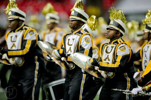 University of Arkansas at Pine Bluff's Christopher Gates (right) crashes his cymbals together during the 2014 Honda Battle of the Bands at the Georgia Dome in Atlanta on Saturday, January 25, 2014. 