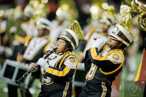 University of Arkansas at Pine Bluff's Justice Cullens (center) plays her clarinet during the 2014 Honda Battle of the Bands at the Georgia Dome in Atlanta on Saturday, January 25, 2014.
