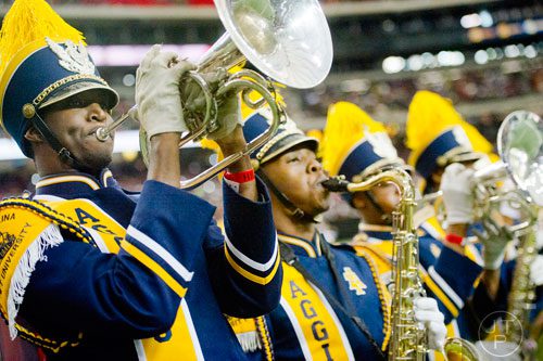 North Carolina A&T State University's Donyel Bruton (left) plays the melophone during the 2014 Honda Battle of the Bands at the Georgia Dome in Atlanta on Saturday, January 25, 2014. 