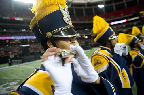 North Carolina A&T State University's Meghan Gerald plays the piccolo during the 2014 Honda Battle of the Bands at the Georgia Dome in Atlanta on Saturday, January 25, 2014.