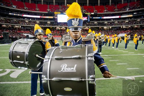 North Carolina A&T State University's Joshua Dowdell plays his bass drum during the 2014 Honda Battle of the Bands at the Georgia Dome in Atlanta on Saturday, January 25, 2014.