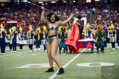 North Carolina A&T State University's Kelly Best twirls her batons as she performs during the 2014 Honda Battle of the Bands at the Georgia Dome in Atlanta on Saturday, January 25, 2014. 