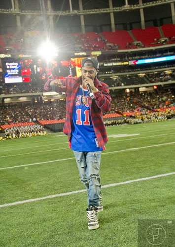 Rap artist Big Sean performs during the 2014 Honda Battle of the Bands at the Georgia Dome in Atlanta on Saturday, January 25, 2014. 