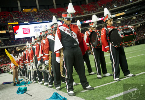 Winston Salem State University's Willie Davis (center) and Shaquessa Price prepare to take the field during the 2014 Honda Battle of the Bands at the Georgia Dome in Atlanta on Saturday, January 25, 2014. 