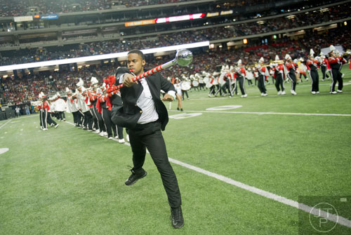 Winston Salem State University drum major Joshua Hayes (center) performs on the field during the 2014 Honda Battle of the Bands at the Georgia Dome in Atlanta on Saturday, January 25, 2014. 