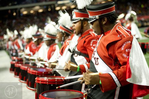 Winston Salem State University's Tyler Curbeam plays his snare drum during the 2014 Honda Battle of the Bands at the Georgia Dome in Atlanta on Saturday, January 25, 2014.