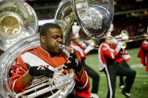 Winston Salem State University's Rashad Sidbury plays his tuba during the 2014 Honda Battle of the Bands at the Georgia Dome in Atlanta on Saturday, January 25, 2014. 