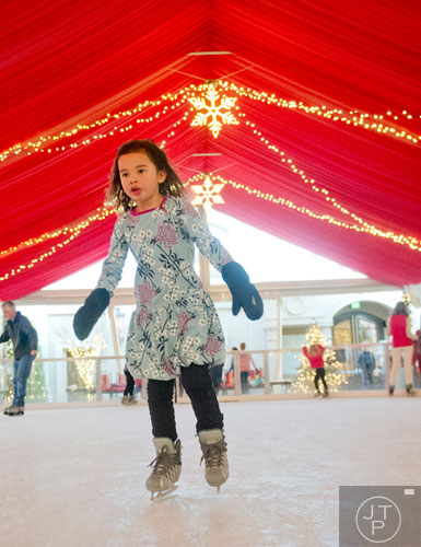 Julia Gibney ice skates at the St. Regis in Buckhead on Wednesday, December 18, 2013. 