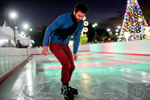 J.C. Hamill ice skates at Atlantic Station in Midtown on Thursday, December 19, 2013. 
